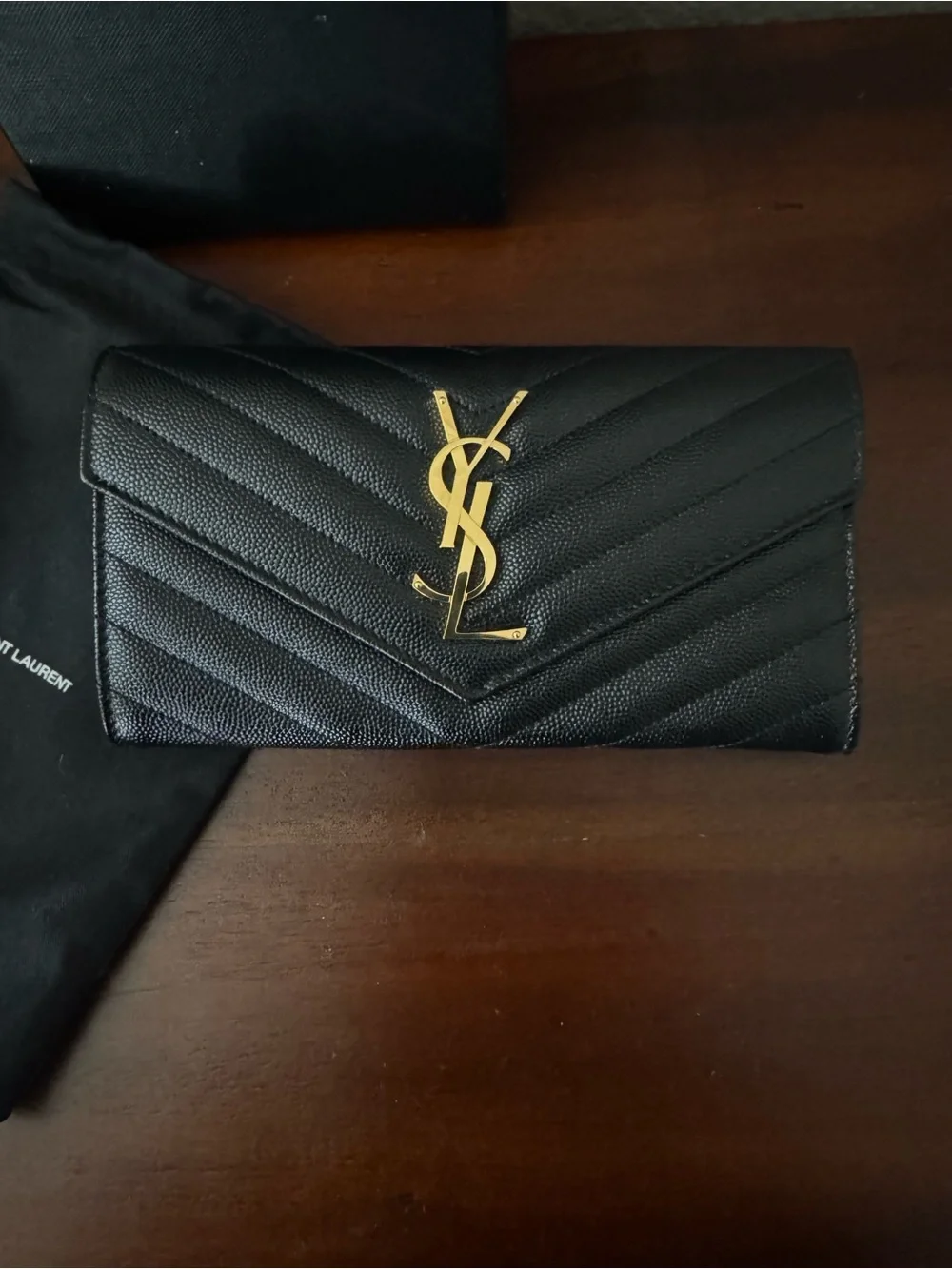 Saint Laurent Cassandre YSL Monogram Large Flap Wallet in grained leather